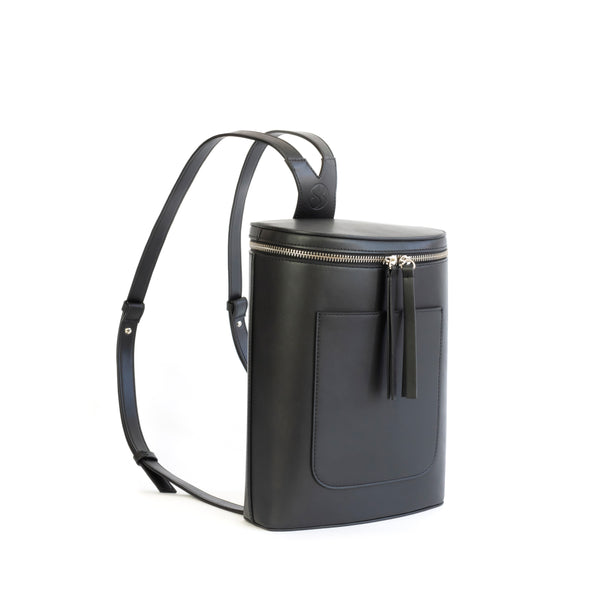 Black eco vegan leather bucket backpack by Sydney Brown. Timeless, classic and modern. Angle