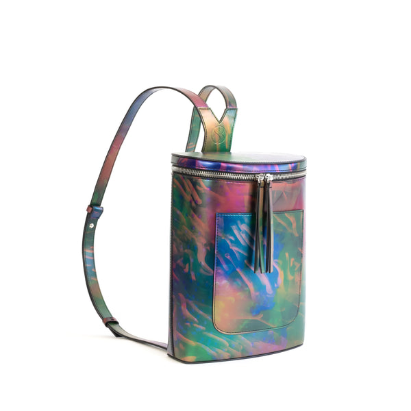 Printed iridescent vegan leather bucket backpack by Sydney Brown. Timeless, classic and modern.  Angle