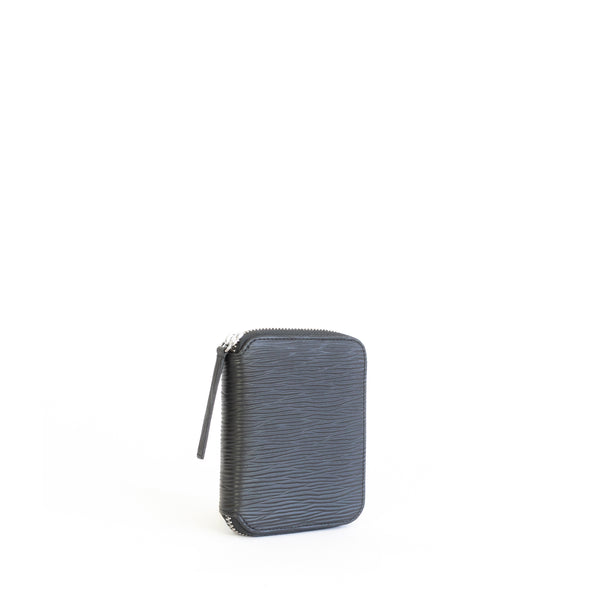 Unisex zipped wallet with inside coin pouch and card slots. Black Emboss faux-leather. Angle