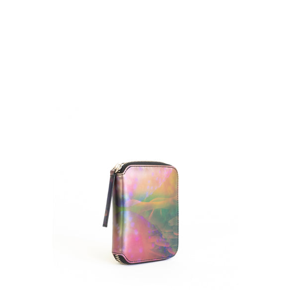 Unisex zipped wallet with inside coin pouch and card slots. Iridescent Print faux-leather. Front Angle