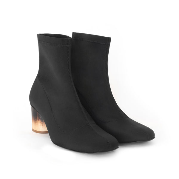 Scuba Sock Boot, high-tech knit upper in Black, low-mid heel design in shou sugi ban.